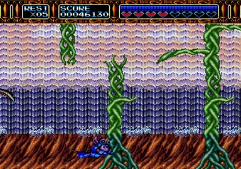 Rocket Knight Adventures — Sparkster on the waterfall vines among owls and gems