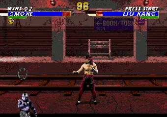 Smoke performing his Teleport Uppercut move in Ultimate Mortal Kombat 3